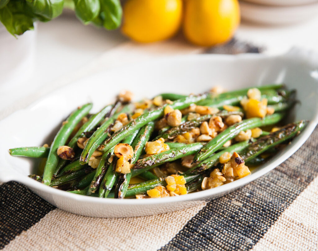 A serving bowl of green beans.