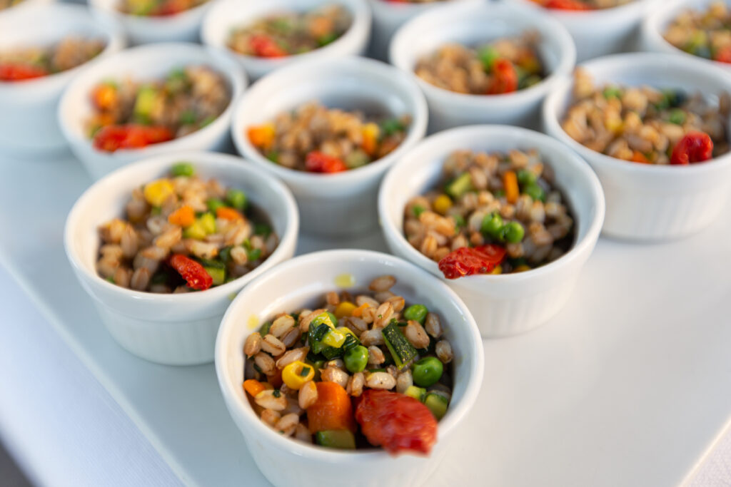 A tray of ramekins with a veg salad