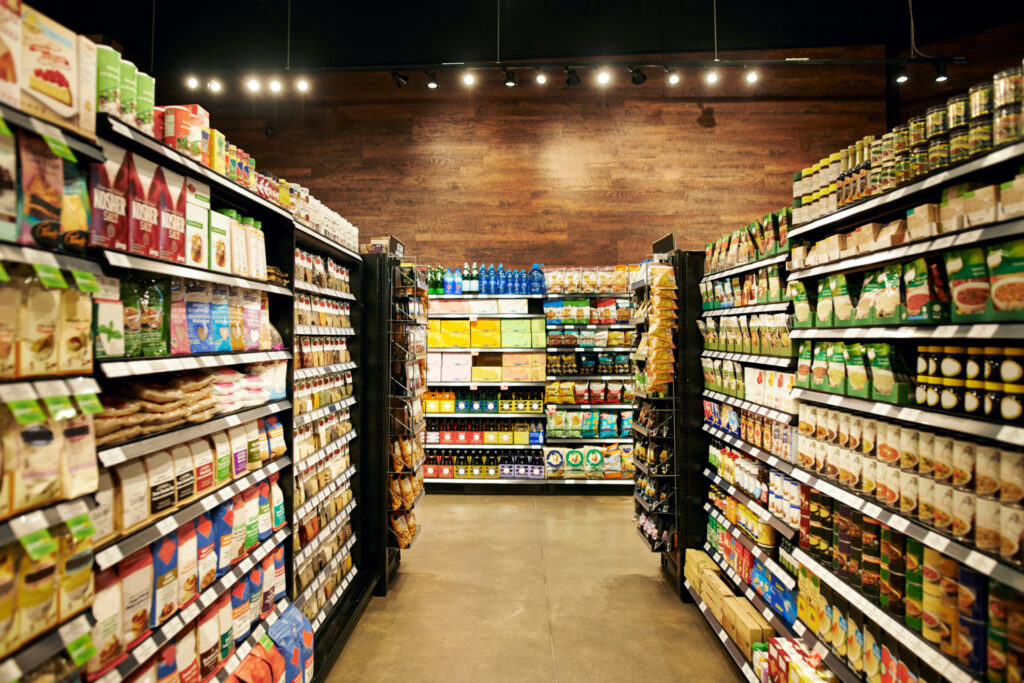 Shot of fully stocked aisles in a grocery store during the day