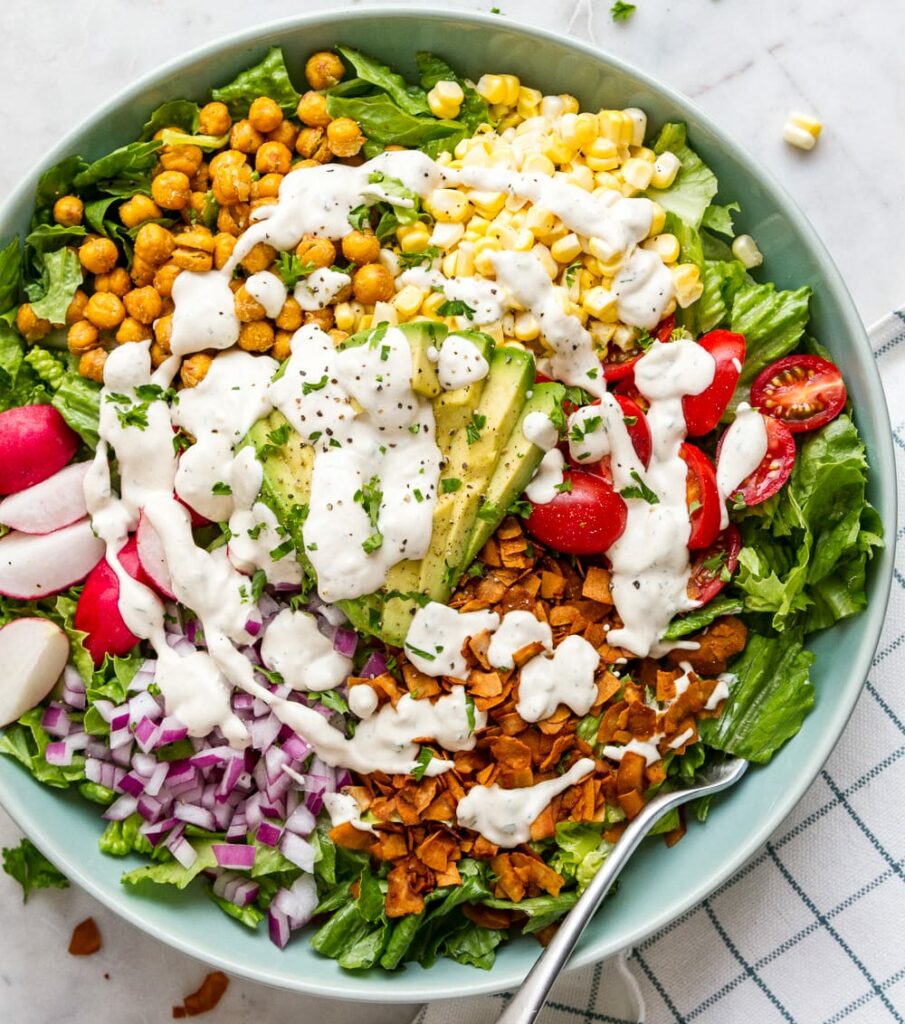 Overhead image of a salad in a bowl, finely diced. 