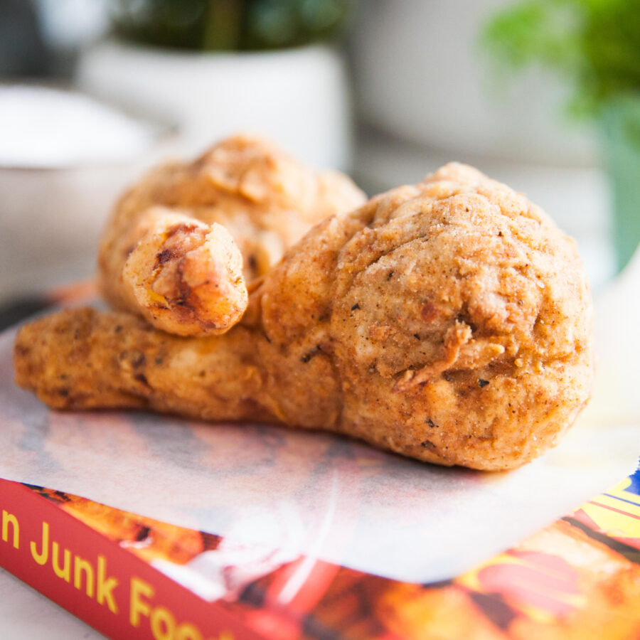 A side profile of two vegan 'chicken' drumsticks'.