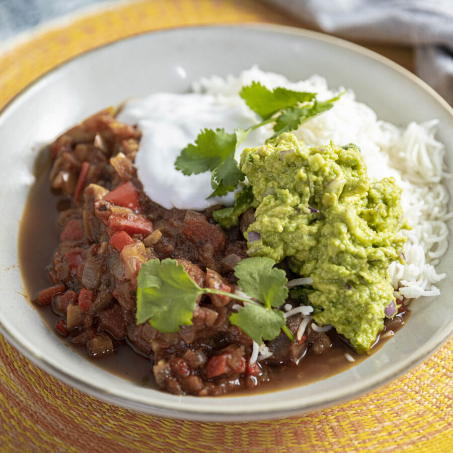 smoked chilli in a bowl with smashed avocado